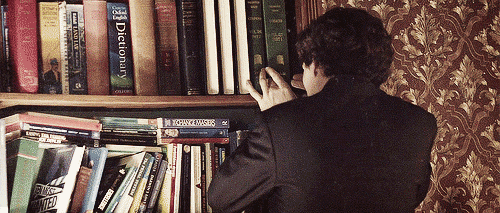 Sherlock gif moving book on bookcase.